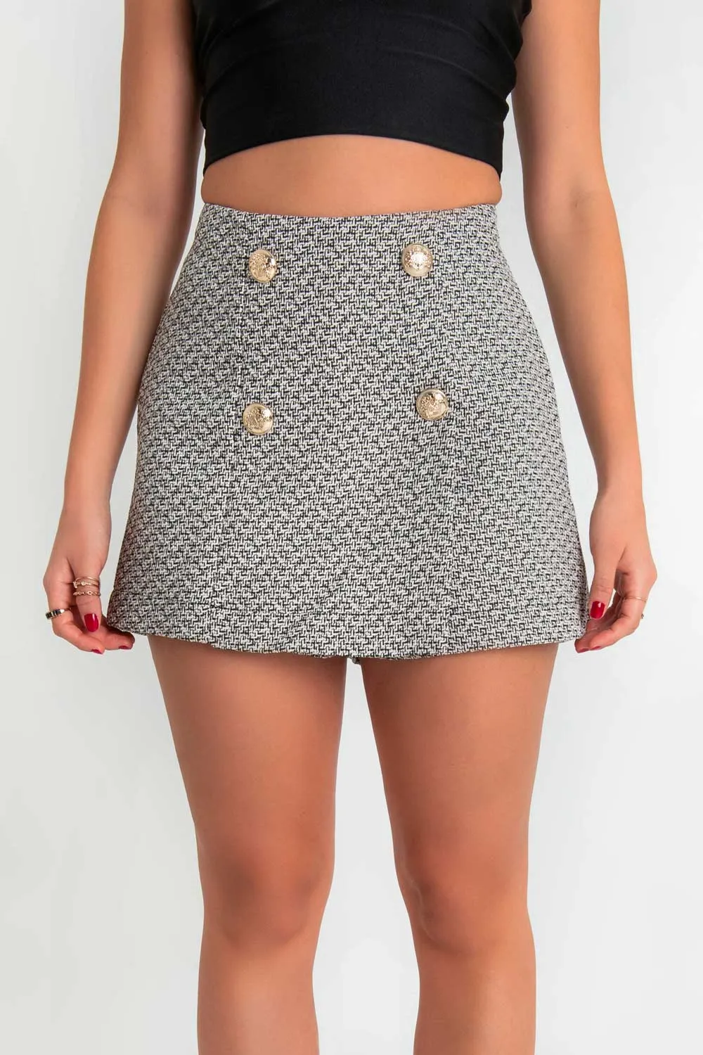 Falda short de bouclé con botones contraste